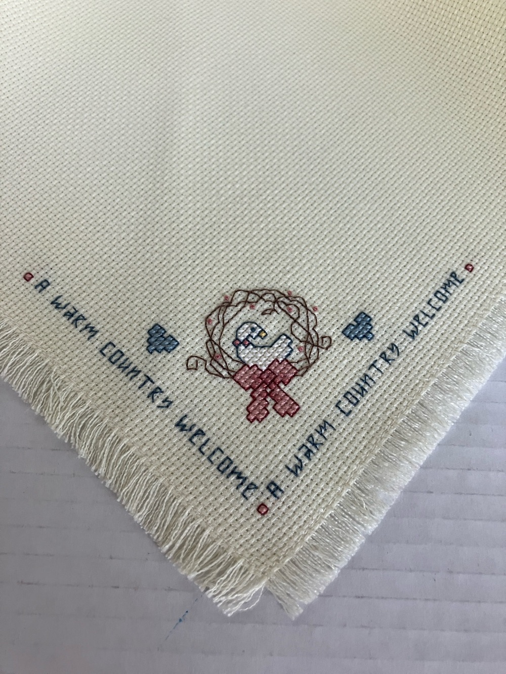Hand Crafted Cream Cross-Stitch Welcome Goose Blue 17”‎ Square Panel One Corner